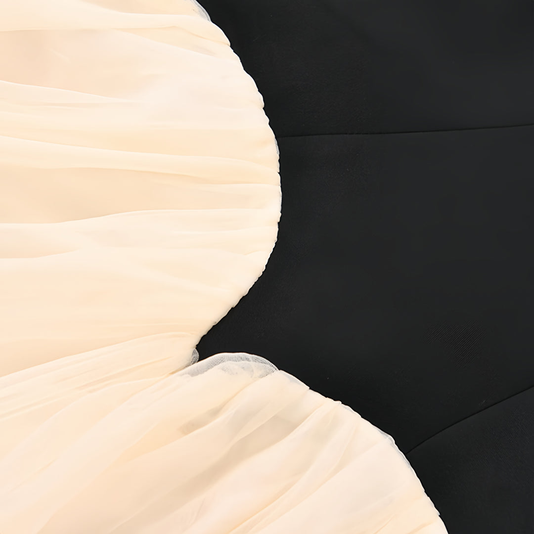 Robe élégante sans manches en patchwork noir et blanc