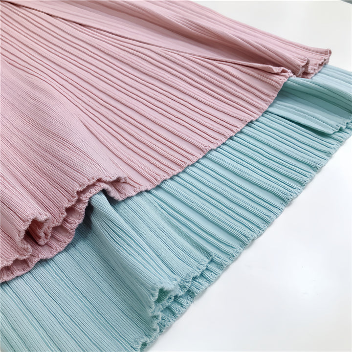 Robe rose sans manches à rayures verticales