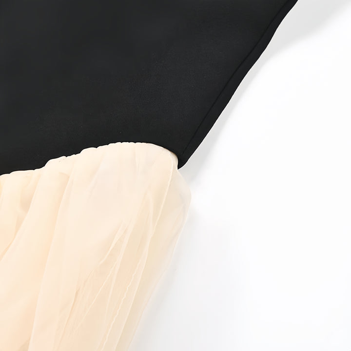 Robe élégante sans manches en patchwork noir et blanc